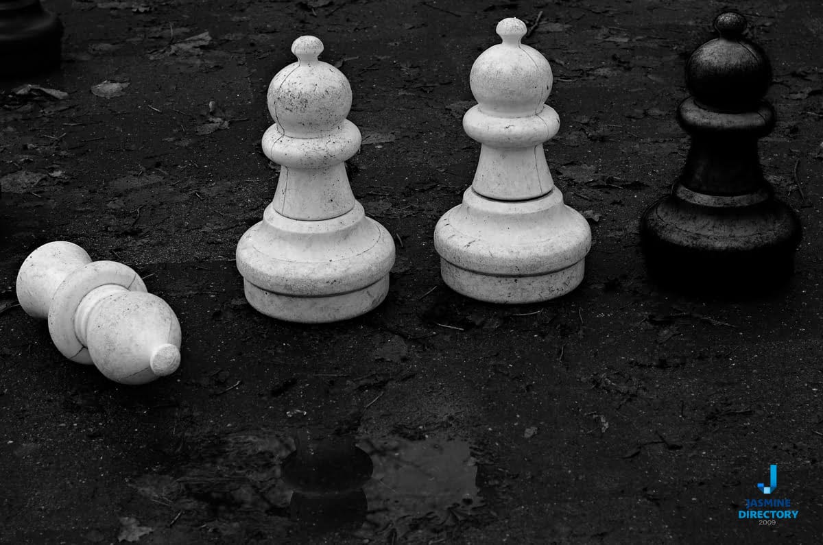 White chess on black background