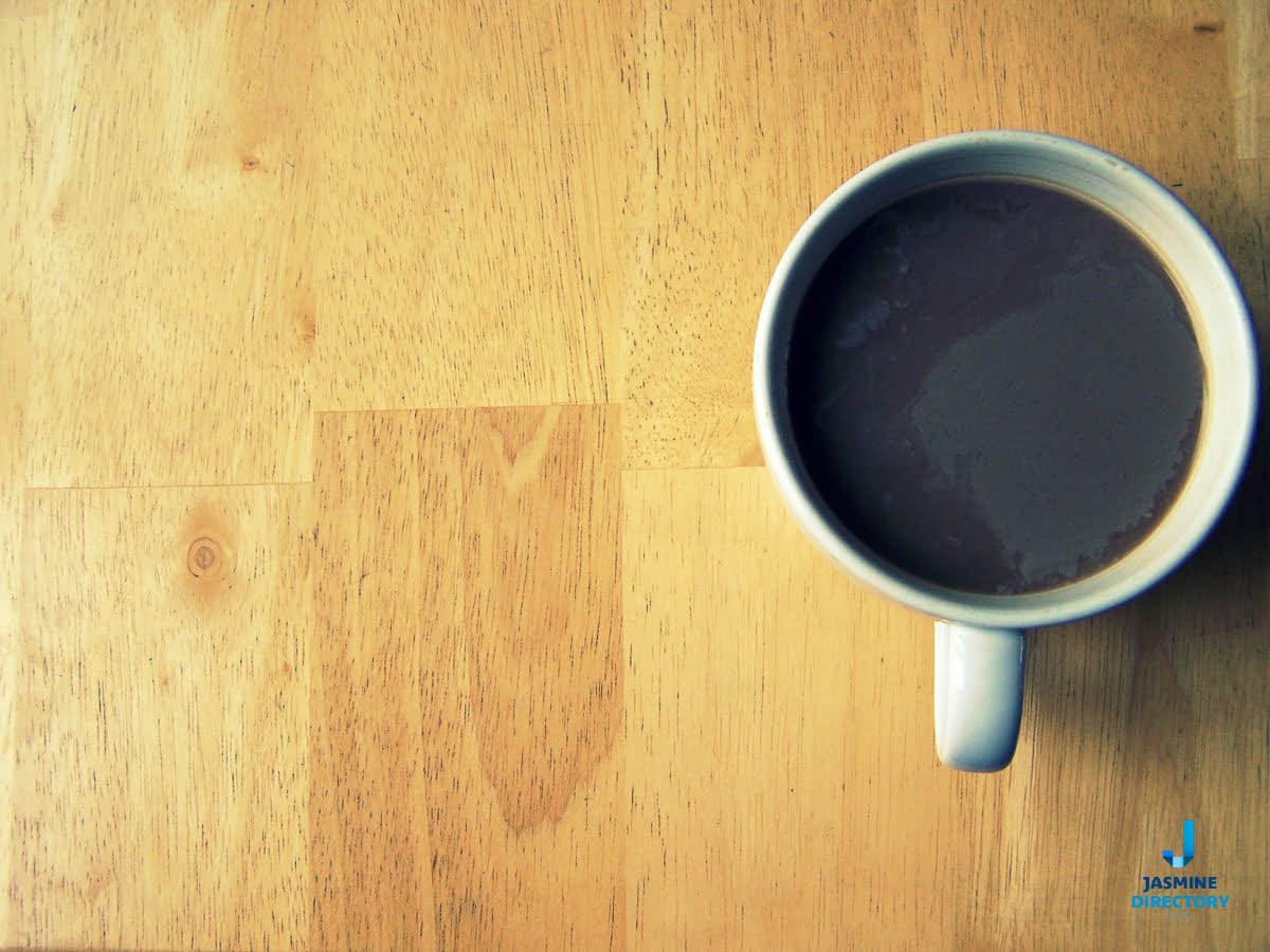 Cup of coffee on a wooden table