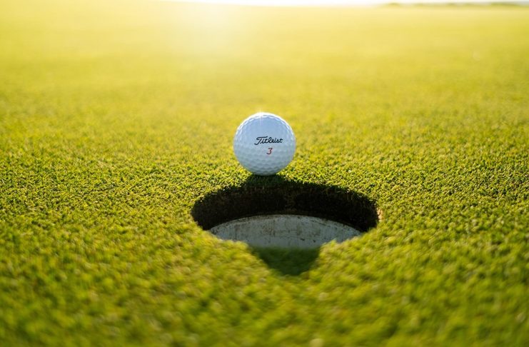 golf ball near hole