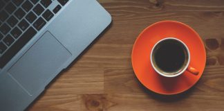 Four Authority Signals AI Reads From Business Listings cup of coffee, laptop, office