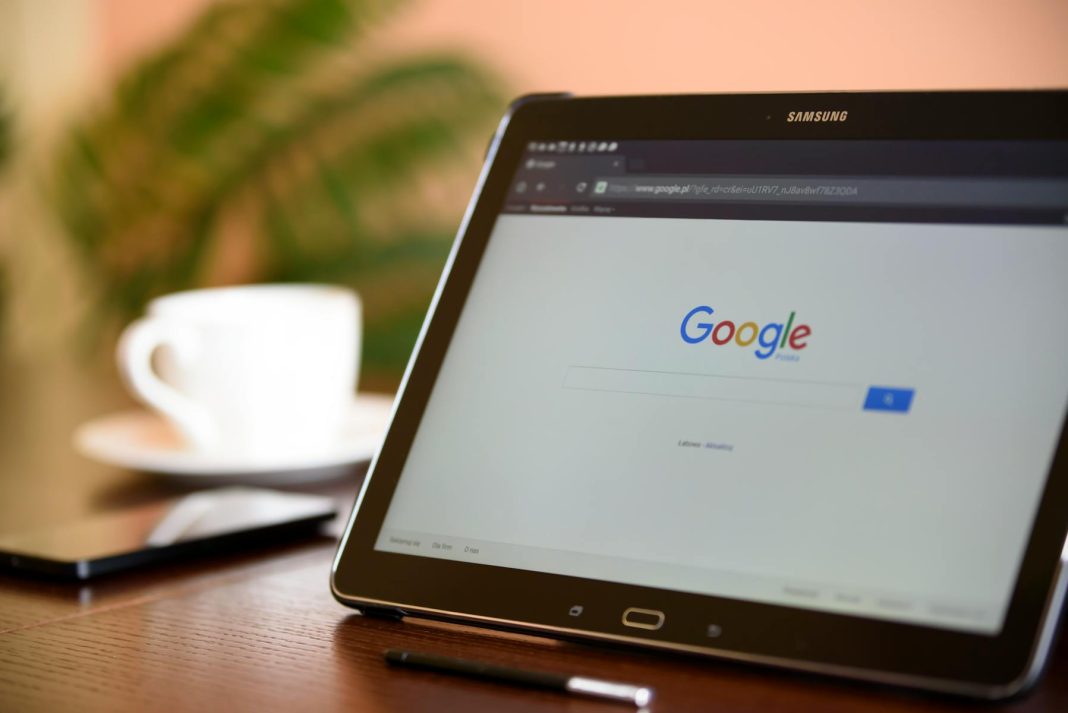 Photo by AS Photography Samsung tablet on desk showing Google homepage, perfect for technology-related content.
