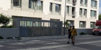 Modern Solutions for Effective Perimeter Security in Commercial and Industrial Properties Top-down aerial view of a derelict garden noticeboard with a sun-bleached old business directory listing card still pinned to it