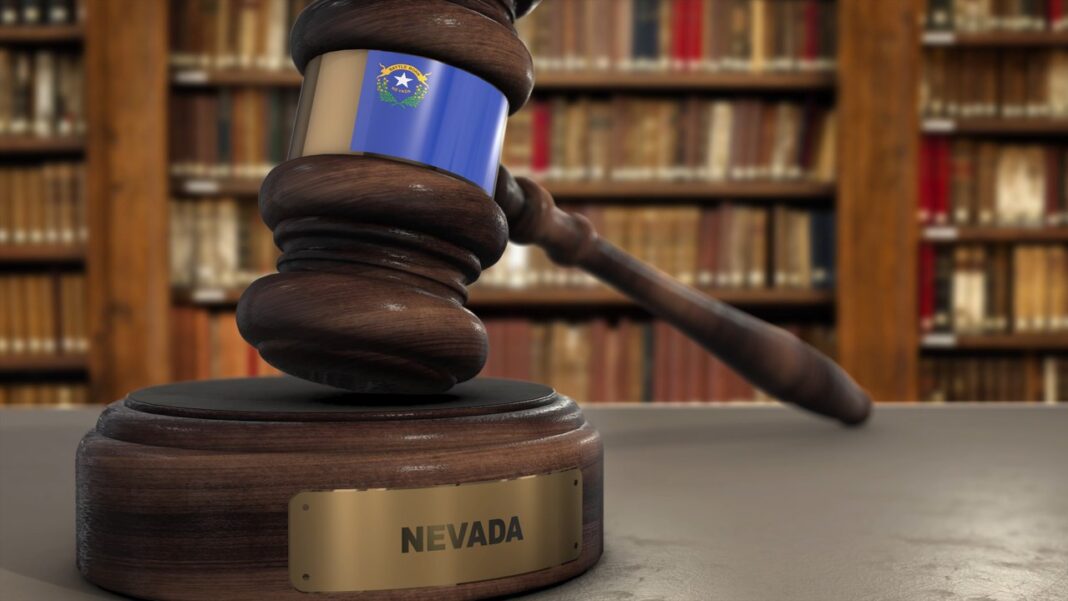 Judicial gavel symbolizing Nevada's legal authority for law firm directory Wooden judge's gavel bearing the Nevada state flag on a brass-plaqued base, with law books in the background, representing Nevada legal authority.