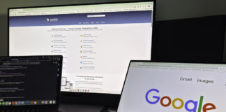 How B2B and trade directories generate qualified leads in 2026 Dual-monitor computer setup on a dark desk showing business directory and search interfaces, illustrating digital tools for B2B lead generation and directory research.