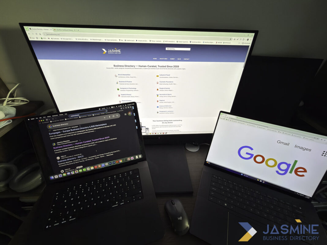 Multi-screen digital workspace illustrates online directory research and evaluation process Three-screen workspace setup showing a monitor with business directory website, laptop with search results, and tablet with Google homepage, illustrating the directory evaluation process.