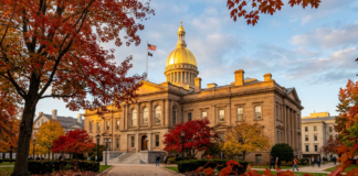 Wisconsin law firm directories: the 2026 guide Neoclassical capitol building with golden dome framed by autumn trees during golden hour, illustrating institutional authority for Wisconsin legal services directory.