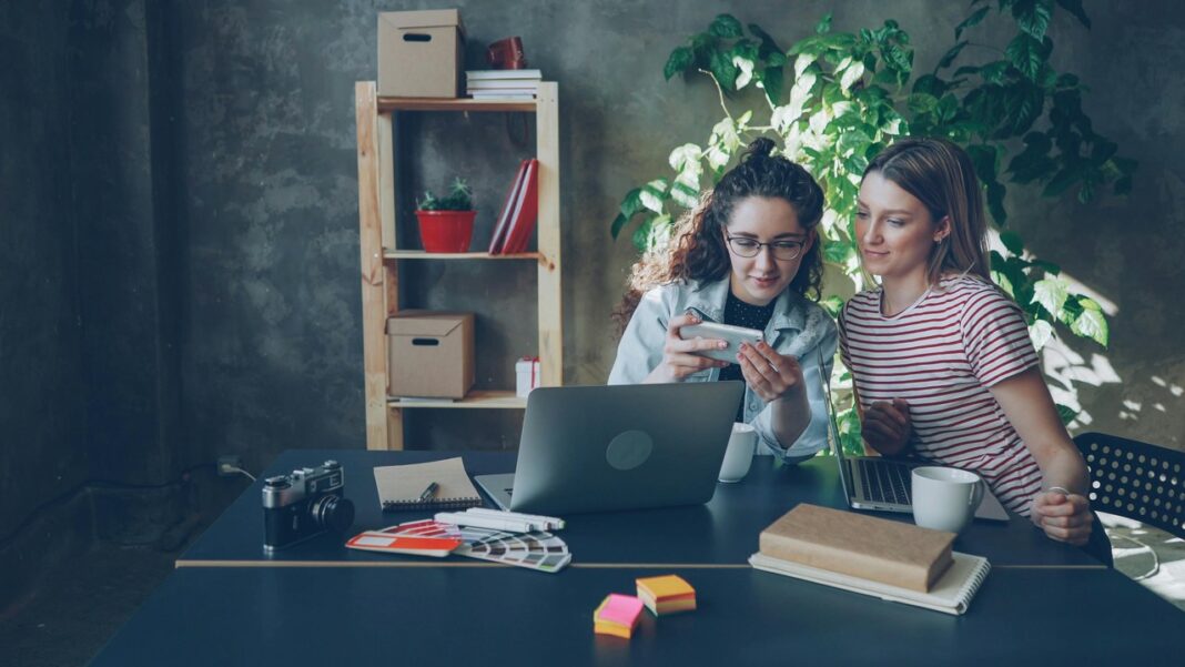 office-collaboration-scene-two-women Office collaboration scene with two women