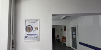 The best law firm directory for Arkansas practices Modern dental clinic hallway with promotional materials and orange waiting room chairs, representing the professional service environment featured in practice directories.