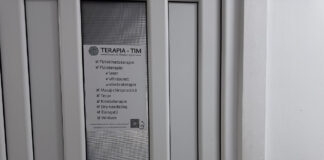 List your practice in Kentucky law firm directories Professional office door with glass panel and printed service directory sign, representing the concept of business listings and practice visibility for law firm directory registration.