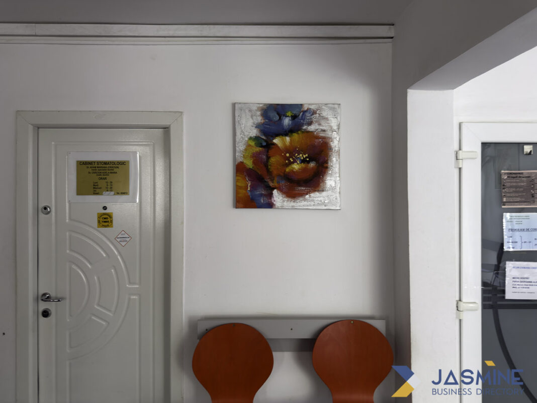 Modern office reception illustrating professional service environments for Oregon law firm directory Professional office waiting area with white walls, floral painting, and orange seating, representing the type of welcoming environment found in Oregon law firms.