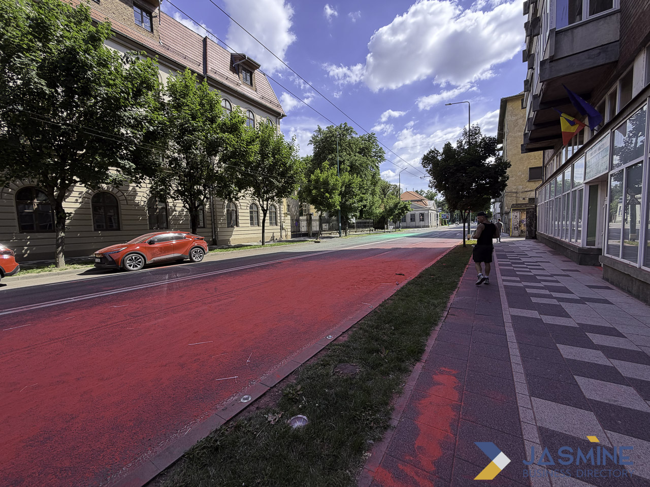 Red urban street with mixed architecture