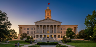 Tennessee State Capitol building illuminated at dusk with neoclassical architecture, representing the state's legal infrastructure where attorneys utilize modern law firm directories.