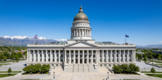 Utah law firms directory: what to know in 2026 The Utah State Capitol building with its iconic dome and columned entrance under clear skies, symbolizing the state's legal and governmental authority structure.