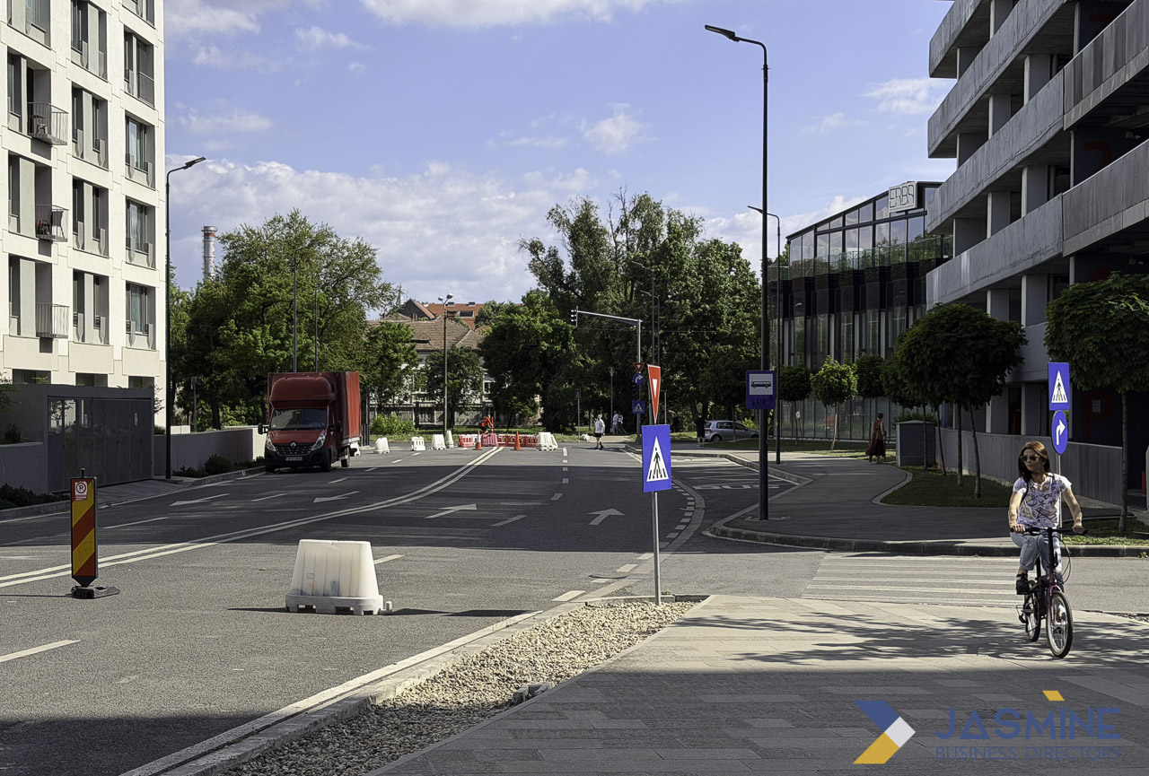 Urban intersection with modern mixed-use buildings