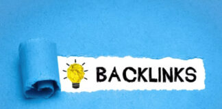 Torn blue paper reveals the word BACKLINKS beside a hand-drawn lightbulb with crumpled yellow paper inside, illustrating link-building strategies for standout business listings.