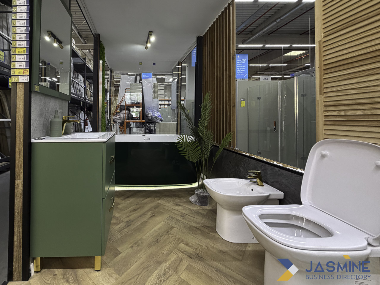 Modern bathroom fixtures showroom displaying vanities, toilets, and shower enclosures, illustrating the range of options available for bathroom upgrade projects.