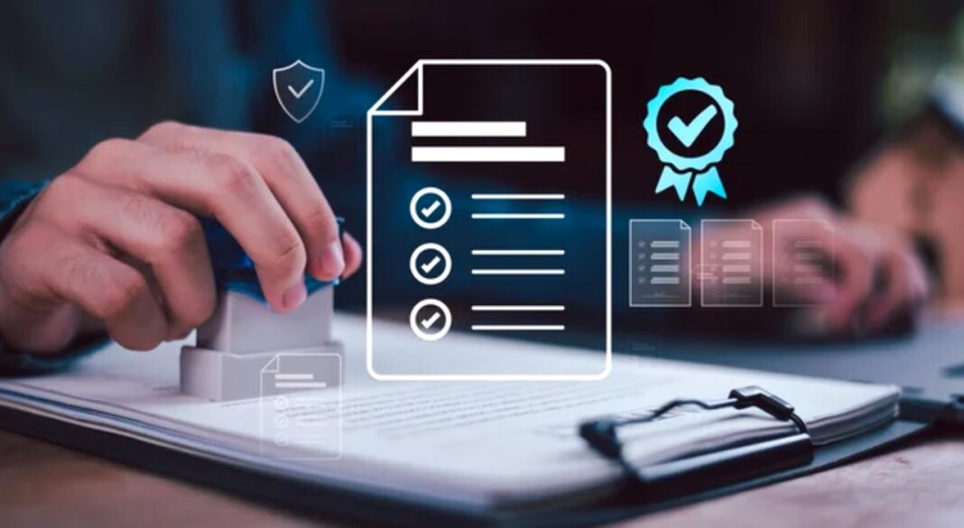 Verification Process Illustrated for Business Directory Listings Hand holding rubber stamp over clipboard with documents and digital overlay showing checkmarks and certification symbols, representing the business directory verification process.