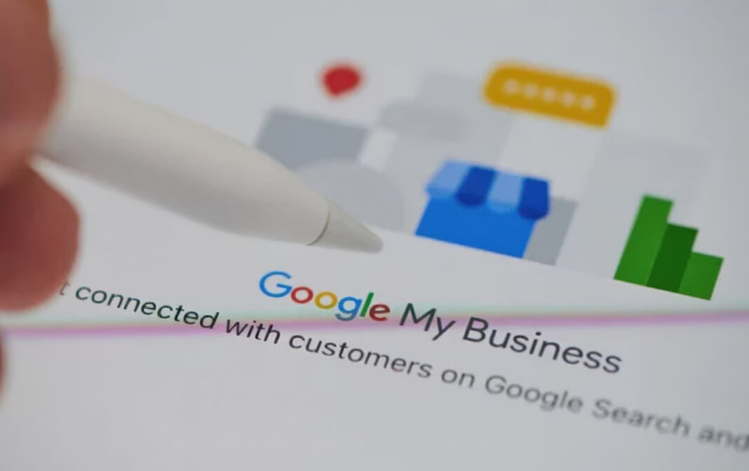 google-my-business-interface-stylus-pen-digital-listing-management-tool White stylus pen near Google My Business interface showing storefront icon and rating symbols, representing digital tools for managing business listing citation authority and verification.