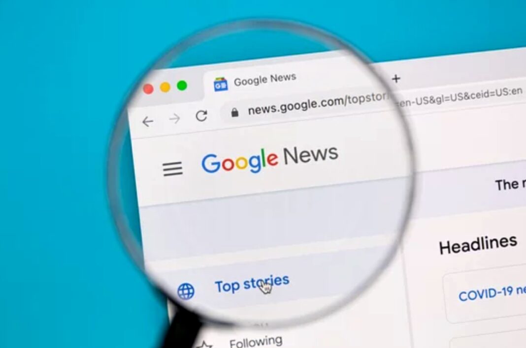 Magnifying glass over Google News homepage illustrating real-time digital news aggregation A magnifying glass hovers over a browser displaying the Google News homepage on a turquoise background, symbolizing scrutiny of digital news aggregation platforms.
