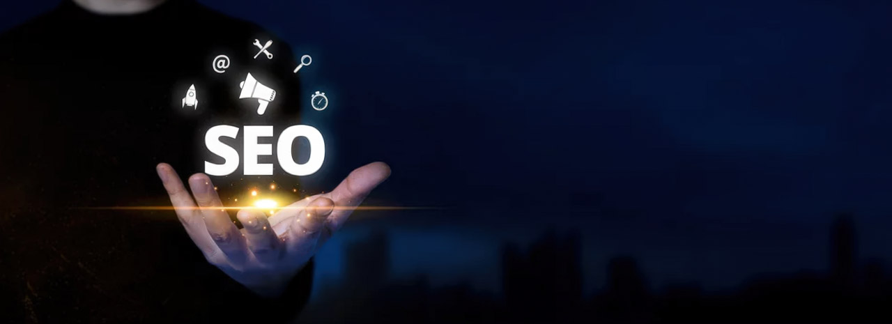 Cupped hands hold glowing light with SEO text and digital marketing icons above, illustrating the power of consistent local search optimization for business visibility.