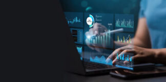 Uncovering ChatGPT Search Sources in Business Directories Hands typing on laptop with holographic data visualizations showing charts and graphs, illustrating the analytical process of uncovering ChatGPT search sources in business directories.