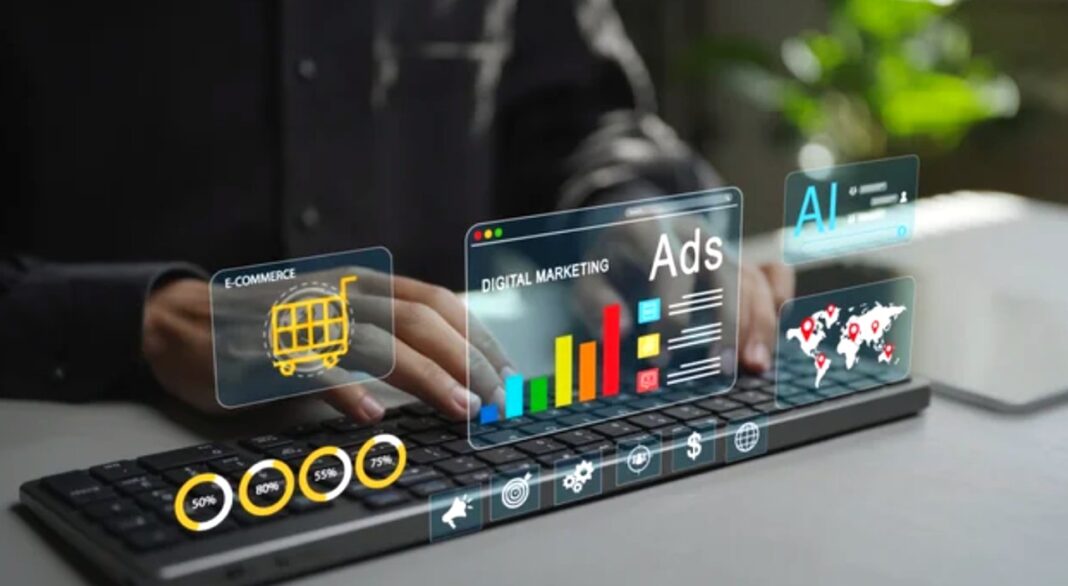 Digital marketing visualization illustrates targeted advertising on connected IoT device ecosystem Hands typing on a laptop with translucent digital marketing graphics and data charts floating above, representing advertising technology reaching connected IoT devices.