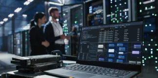 Laptop displaying network diagnostics software positioned in data center with illuminated server racks, representing technical infrastructure maintenance that prevents website performance issues.