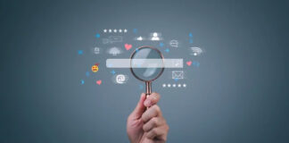 Eight Citation Mistakes That Hurt AI Search Visibility Hand holding magnifying glass over digital search bar with floating social media icons, representing the careful examination needed to avoid citation mistakes in business listings.
