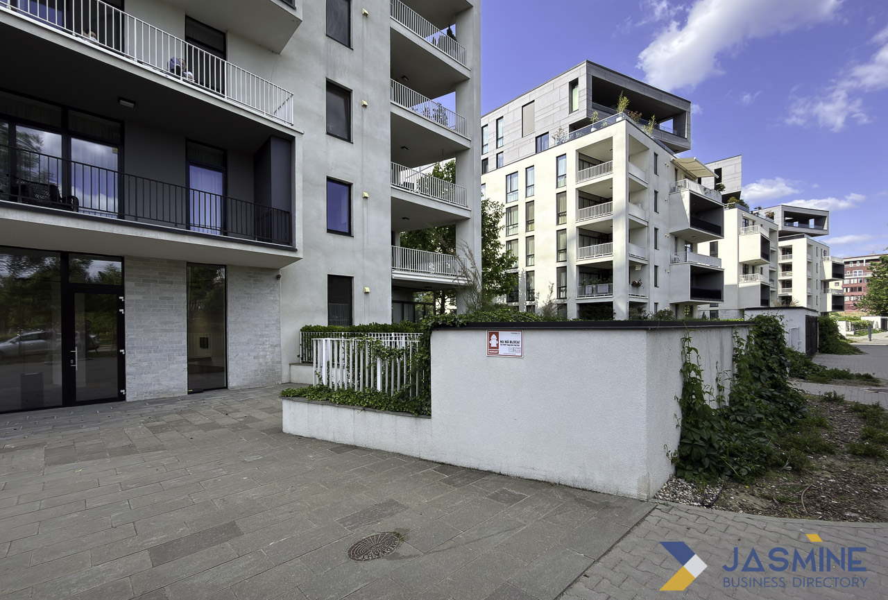 Modern apartment complex with multiple buildings and balconies in Timișoara, Romania, representing contemporary residential properties marketed through interactive floor plans and digital visualization tools.