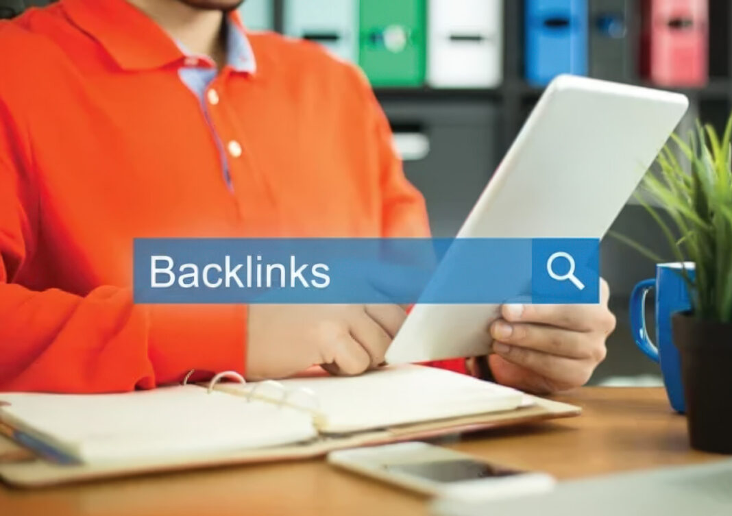 Person researching backlinks on tablet demonstrates directory link navigation and SEO workflow Person holding tablet with backlinks search overlay at office desk, illustrating directory link research and navigation workflow for SEO strategy.