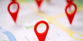 Simple Steps to Rank on Google Maps Three red location pin markers stand on a street map showing roads and landmarks, representing local business visibility in Google Maps search results.