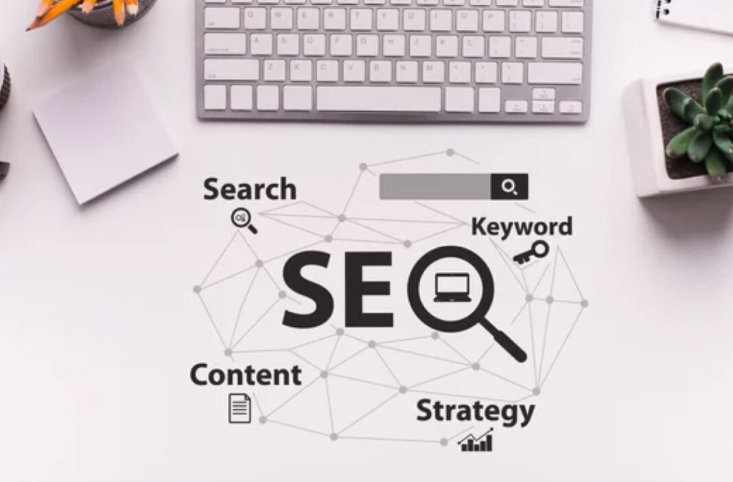 SEO concept workspace illustrating the evolving landscape of search engine optimization and digital marketing Overhead view of a desk workspace with SEO concept graphic showing interconnected icons and network lines, illustrating the changing nature of search engine optimization strategies.