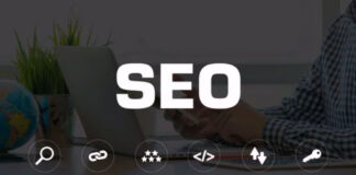 The New Way to Think About SEO Digital graphic showing 'SEO' text with circular icons representing optimization elements overlaid on a workspace with hands typing on laptop, illustrating modern search engine optimization strategy.