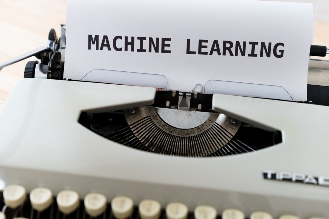 Vintage typewriter symbolizes the evolution from analog to AI-powered SEO automation Vintage typewriter with 'MACHINE LEARNING' typed on white paper, illustrating the technological evolution driving modern AI-powered SEO strategies.