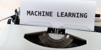 AI visibility tools for multi-brand portfolios: 6 platforms matched to the questions an AI visibility audit raises (2026) Vintage typewriter with 'MACHINE LEARNING' typed on white paper, illustrating the technological evolution driving modern AI-powered SEO strategies.
