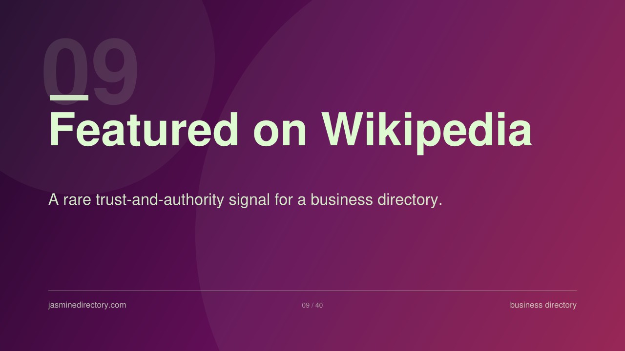 Presentation slide with purple-pink gradient showing 'Featured on Wikipedia' text, illustrating how business directories establish trust through authoritative platform recognition.
